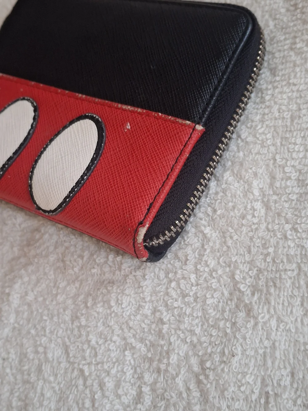 Disney Loungefly zip-around wallet featuring a white Mickey Mouse gloved hand